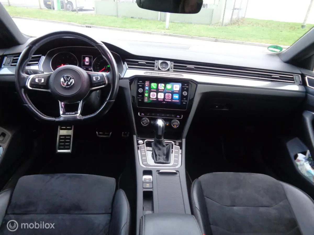 2.0 TSI Business R-Line/ DSG-7/Pano/DCC/Stoeverw/ 20'' Lm velgen/FULL LED/Afn trekhaak/Camera/Airco/nieuwstaat
