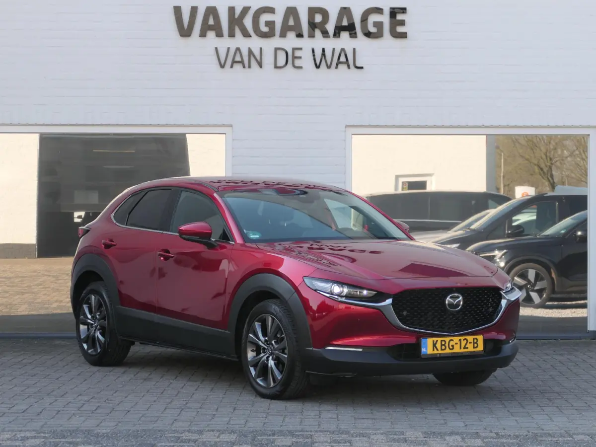 2.0 e-SkyActiv-X M Hybrid Selection | 360°-camera | BOSE | Head-up display | Apple-/Android Carplay | Stuur-/Stoelverwarming | ACC | Dodehoek detectie | Elektrische achterklep