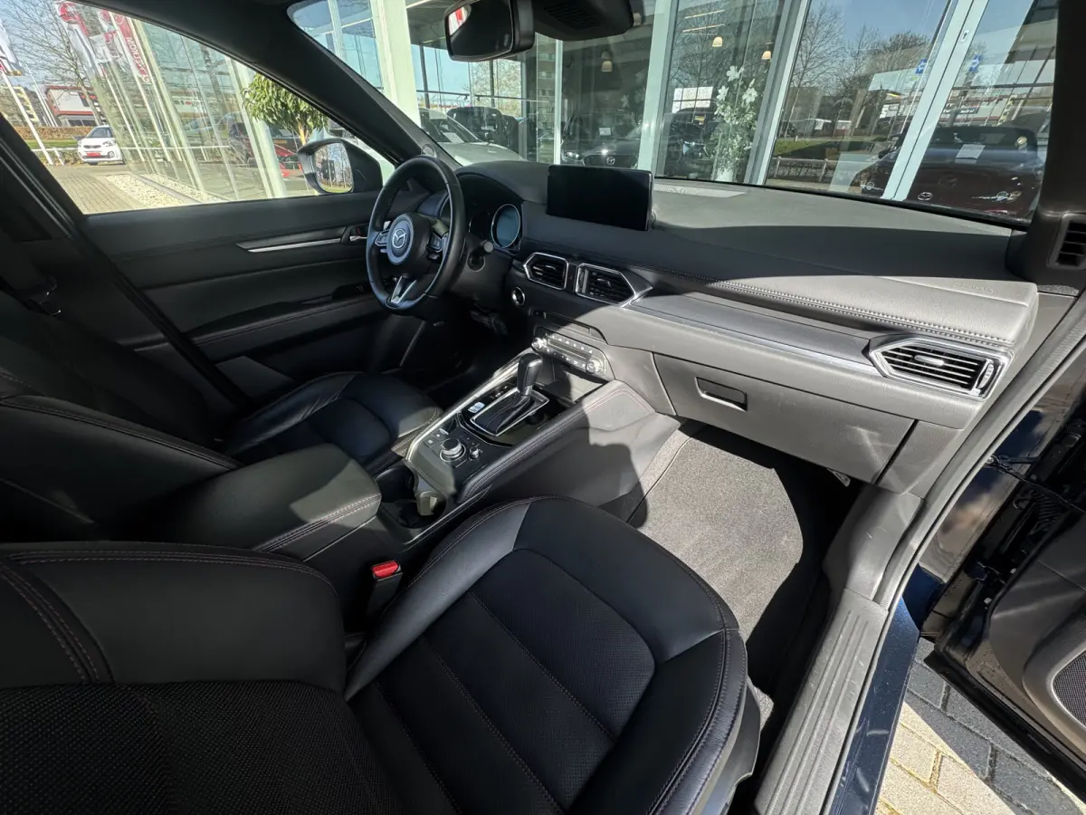 2.0 e-SkyActiv-G M Hybrid 165 Homura Trekhaak / Bose / Camera / Head-Up / Leer / Navi / Clima / Cruise