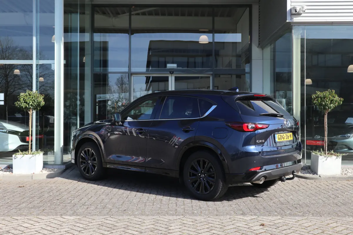 2.0 e-SkyActiv-G M Hybrid 165 Homura Trekhaak / Bose / Camera / Head-Up / Leer / Navi / Clima / Cruise