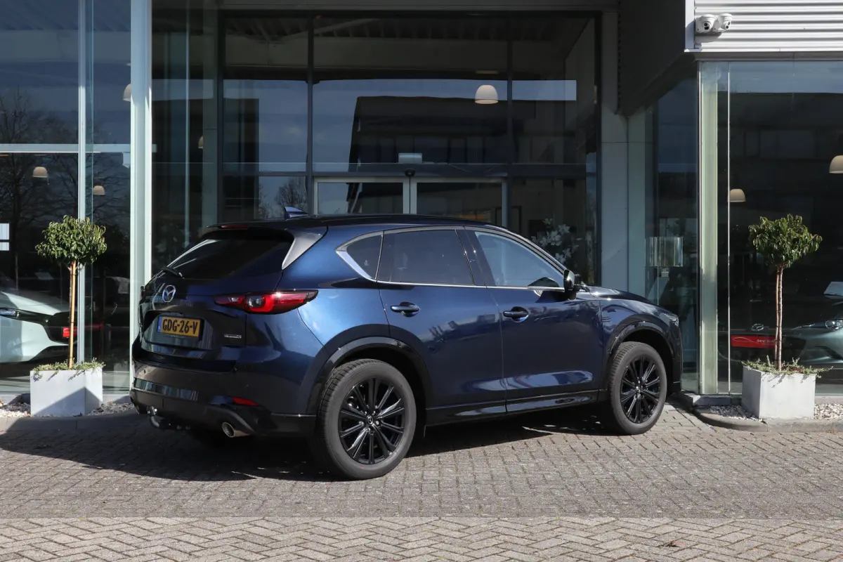 2.0 e-SkyActiv-G M Hybrid 165 Homura Trekhaak / Bose / Camera / Head-Up / Leer / Navi / Clima / Cruise