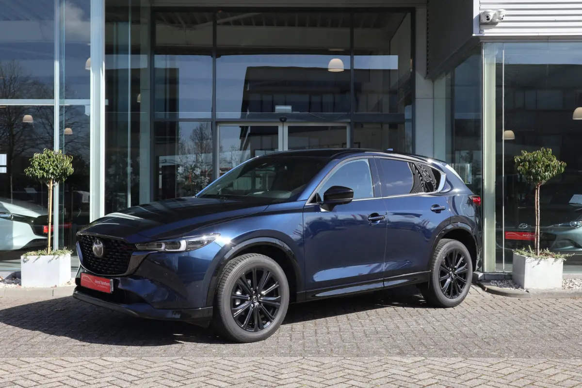 2.0 e-SkyActiv-G M Hybrid 165 Homura Trekhaak / Bose / Camera / Head-Up / Leer / Navi / Clima / Cruise