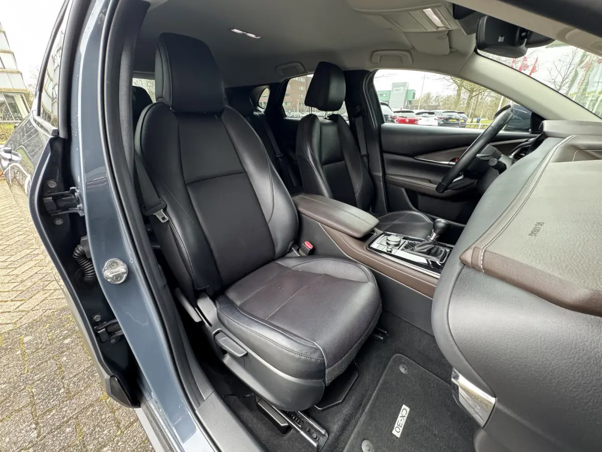 2.0 e-SkyActiv-X M Hybrid Luxury Leer / Trekhaak / Camera / Clima / Navi / Cruise