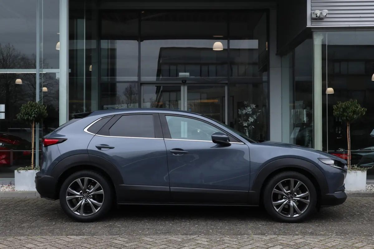 2.0 e-SkyActiv-X M Hybrid Luxury Leer / Trekhaak / Camera / Clima / Navi / Cruise