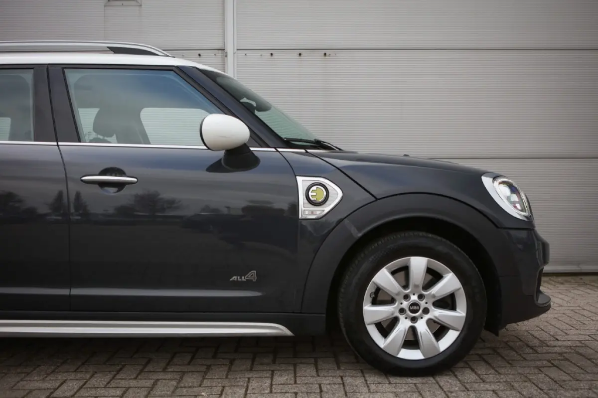 Mini 1.5 Cooper ALL4 | Navi | Hybride | Trekhaak |