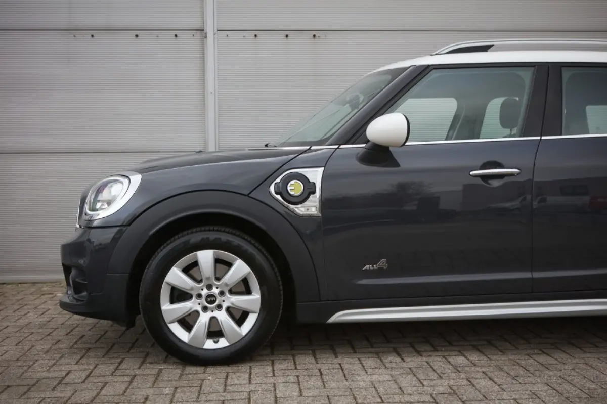 Mini 1.5 Cooper ALL4 | Navi | Hybride | Trekhaak |