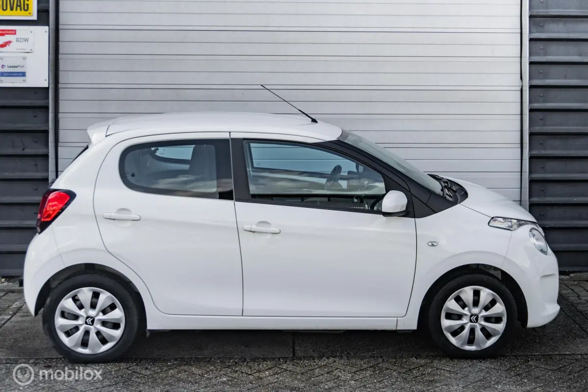 1.0 VTi Shine |Stoelverwarming|Camera|Carplay