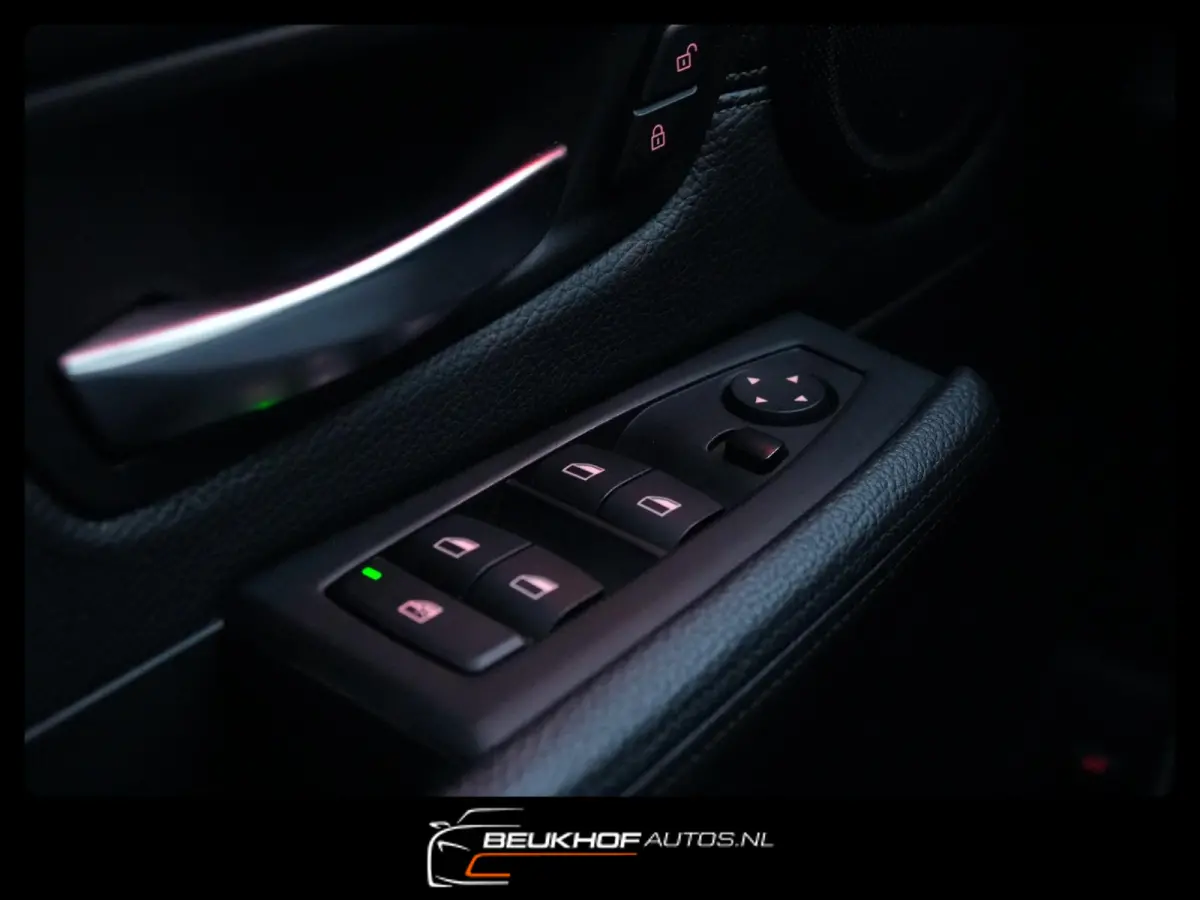218i High Executive Automaat Leer