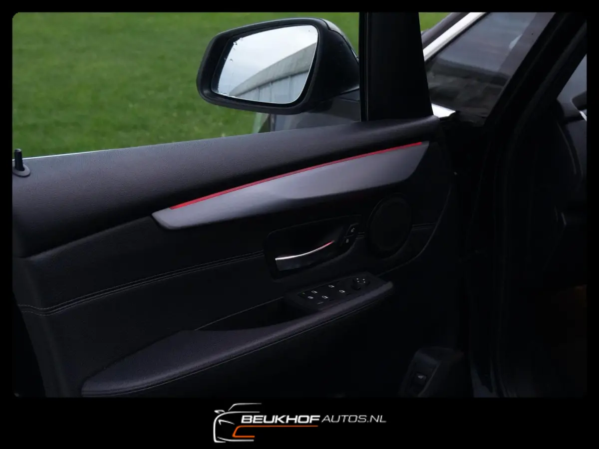 218i High Executive Automaat Leer