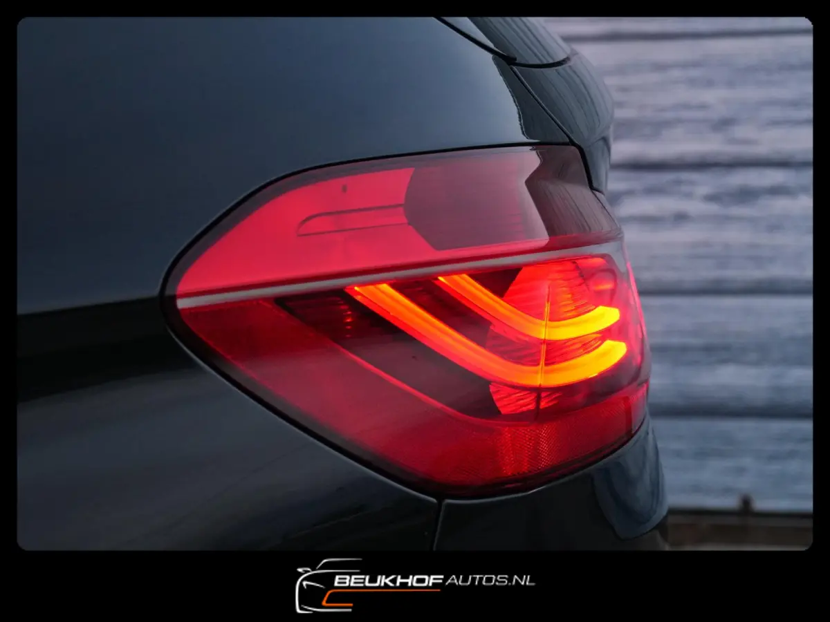218i High Executive Automaat Leer