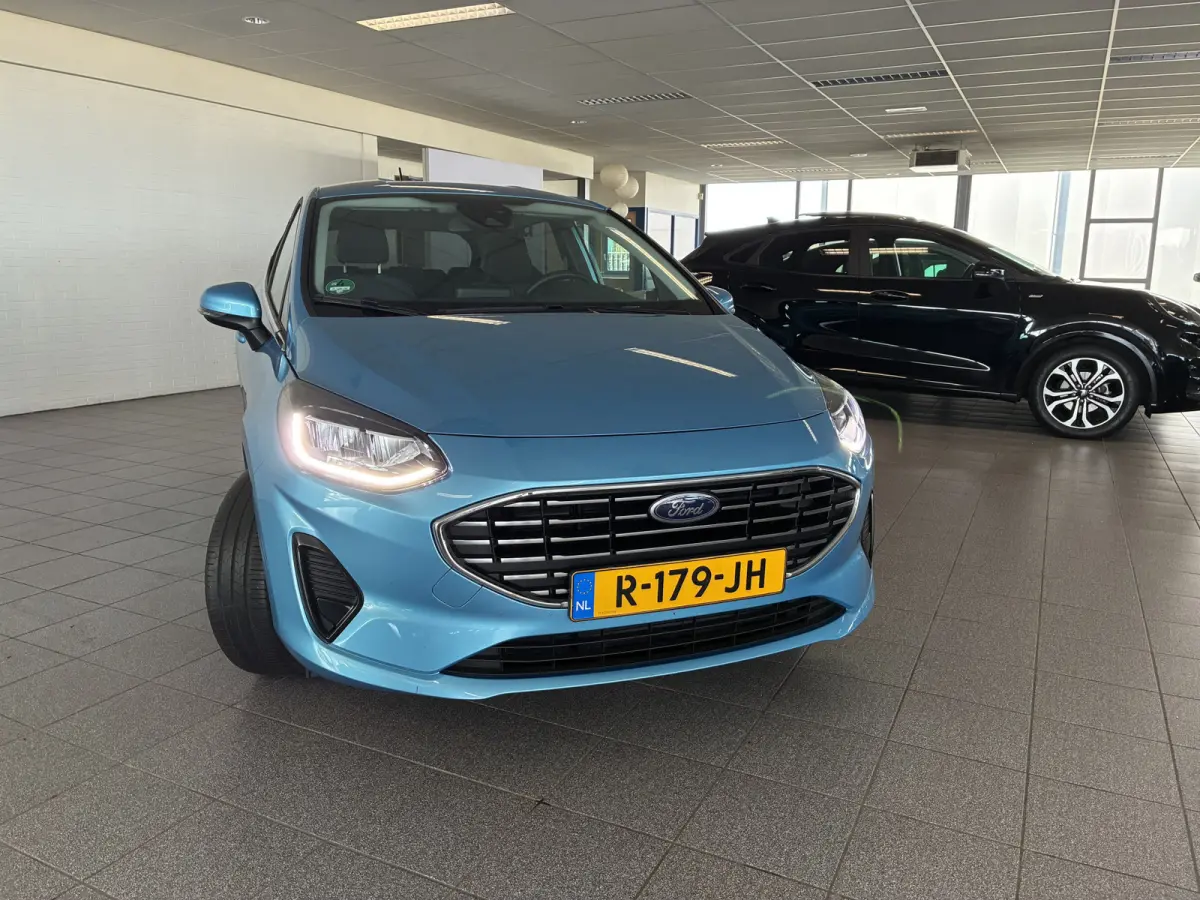 125pk Hybride Titanium MHEV winterpakket-apple carplay-privacyglass