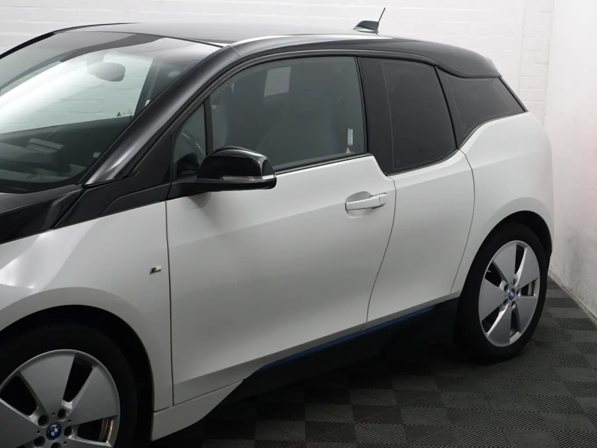 High Voltage Edition 94Ah 33 kWh- Xenon Led, Park Assist, Stoelverwarming, Navigatie, Cruise, Privacy Glass