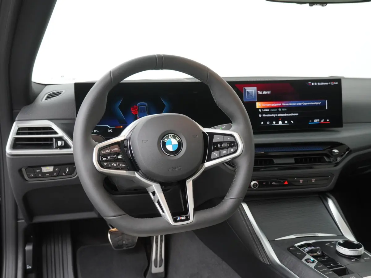 eDrive40 84 kWh | SoH 100% | M-Sportpakket Pro | HiFi | Panoramadak | Adaptive Cruise | Stuurverwarming