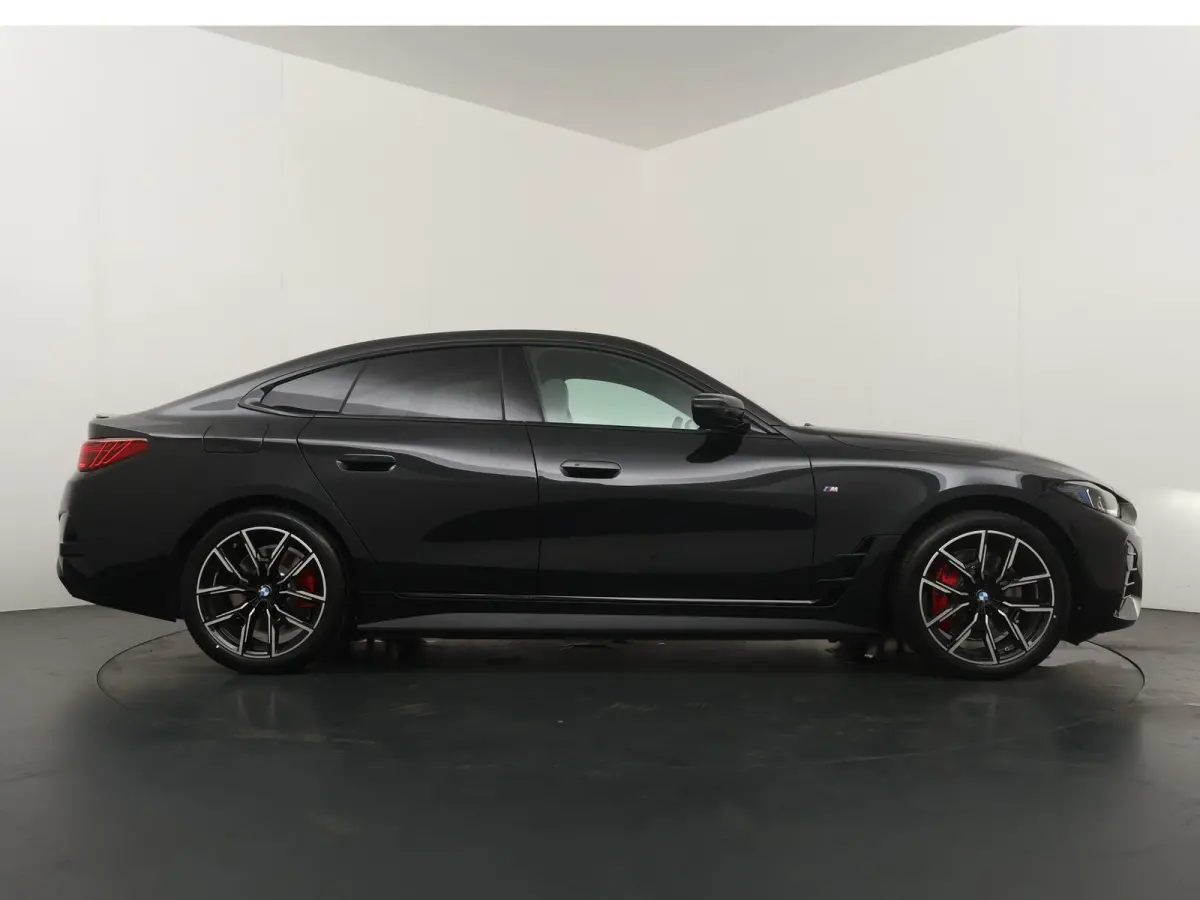 eDrive40 84 kWh | SoH 100% | M-Sportpakket Pro | HiFi | Panoramadak | Adaptive Cruise | Stuurverwarming