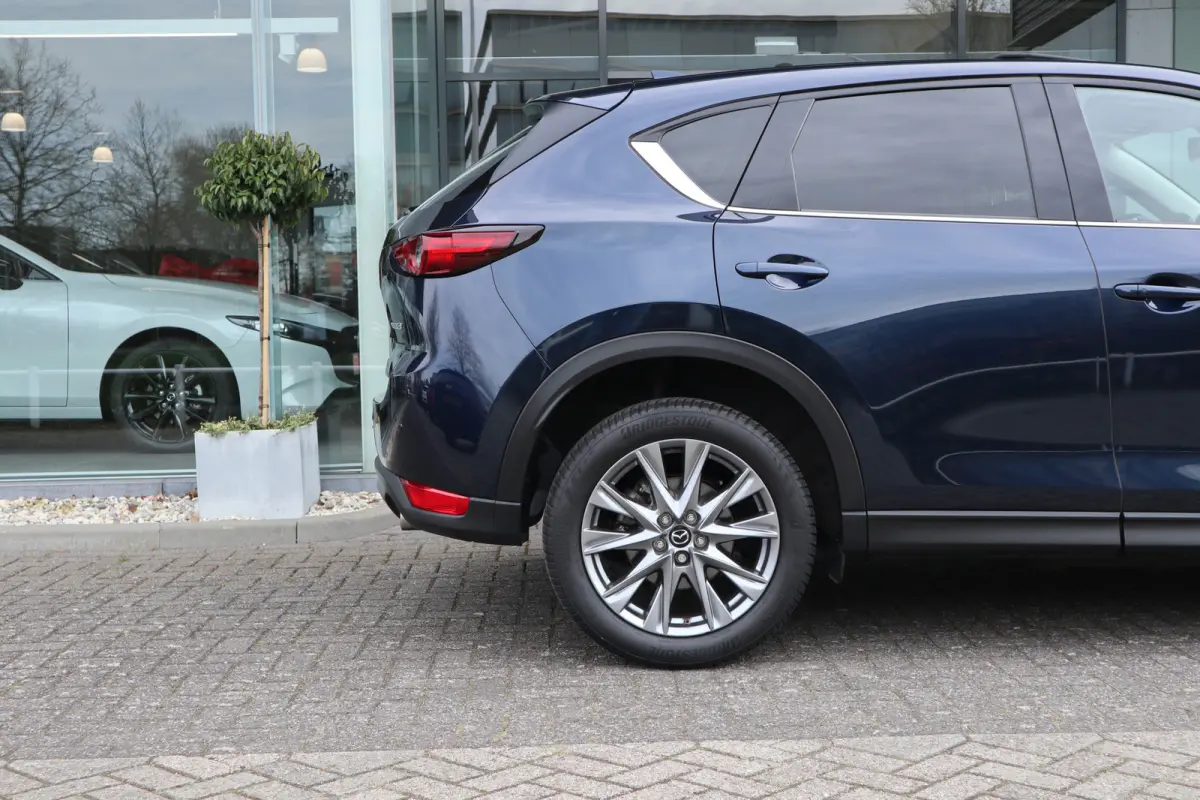 2.0 SkyActiv-G 165 Luxury Automaat / Schuifdak / Leer / Bose / Clima / Navi / Cruise