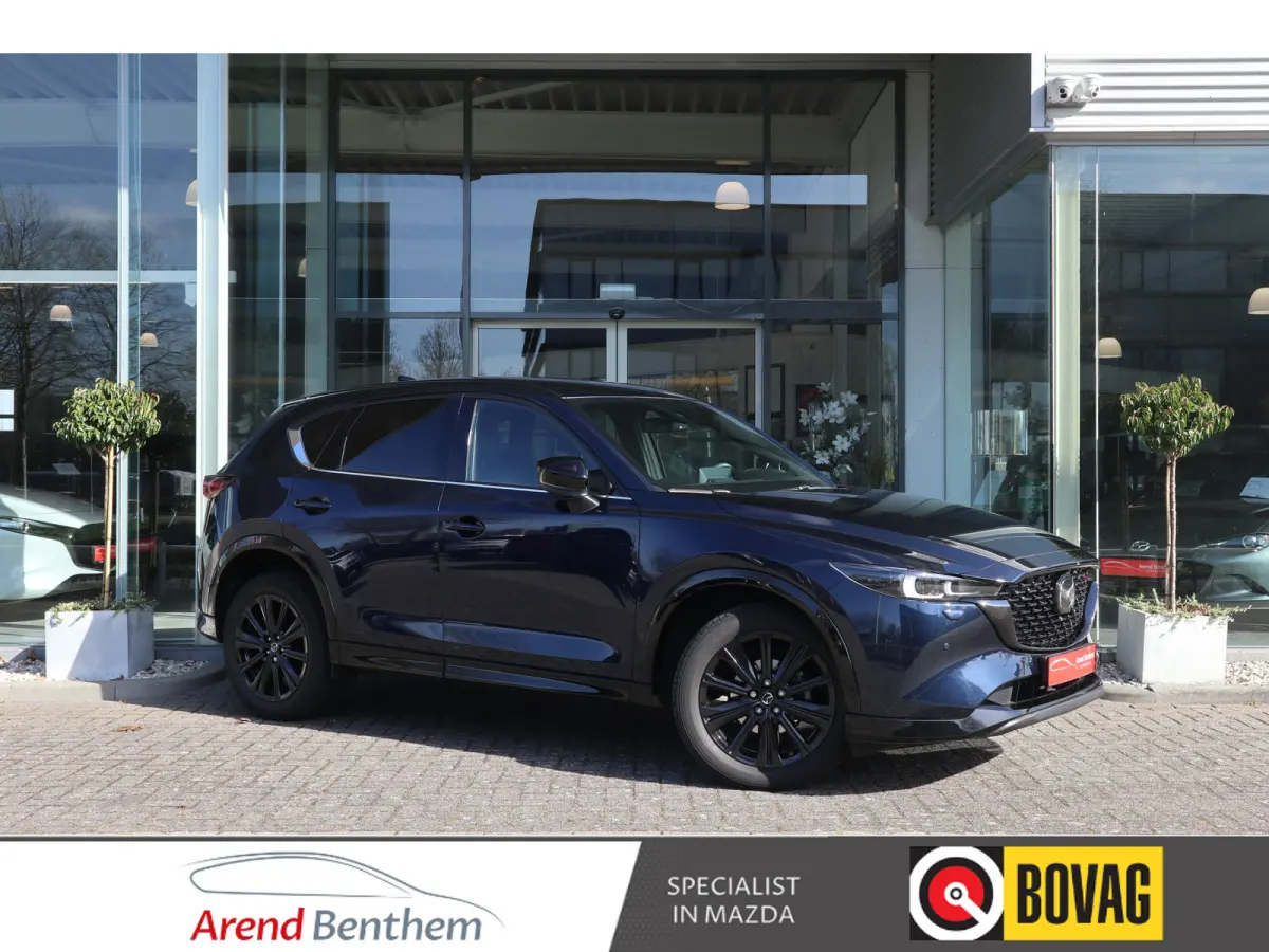 2.0 e-SkyActiv-G M Hybrid 165 Homura Trekhaak / Bose / Camera / Head-Up / Leer / Navi / Clima / Cruise