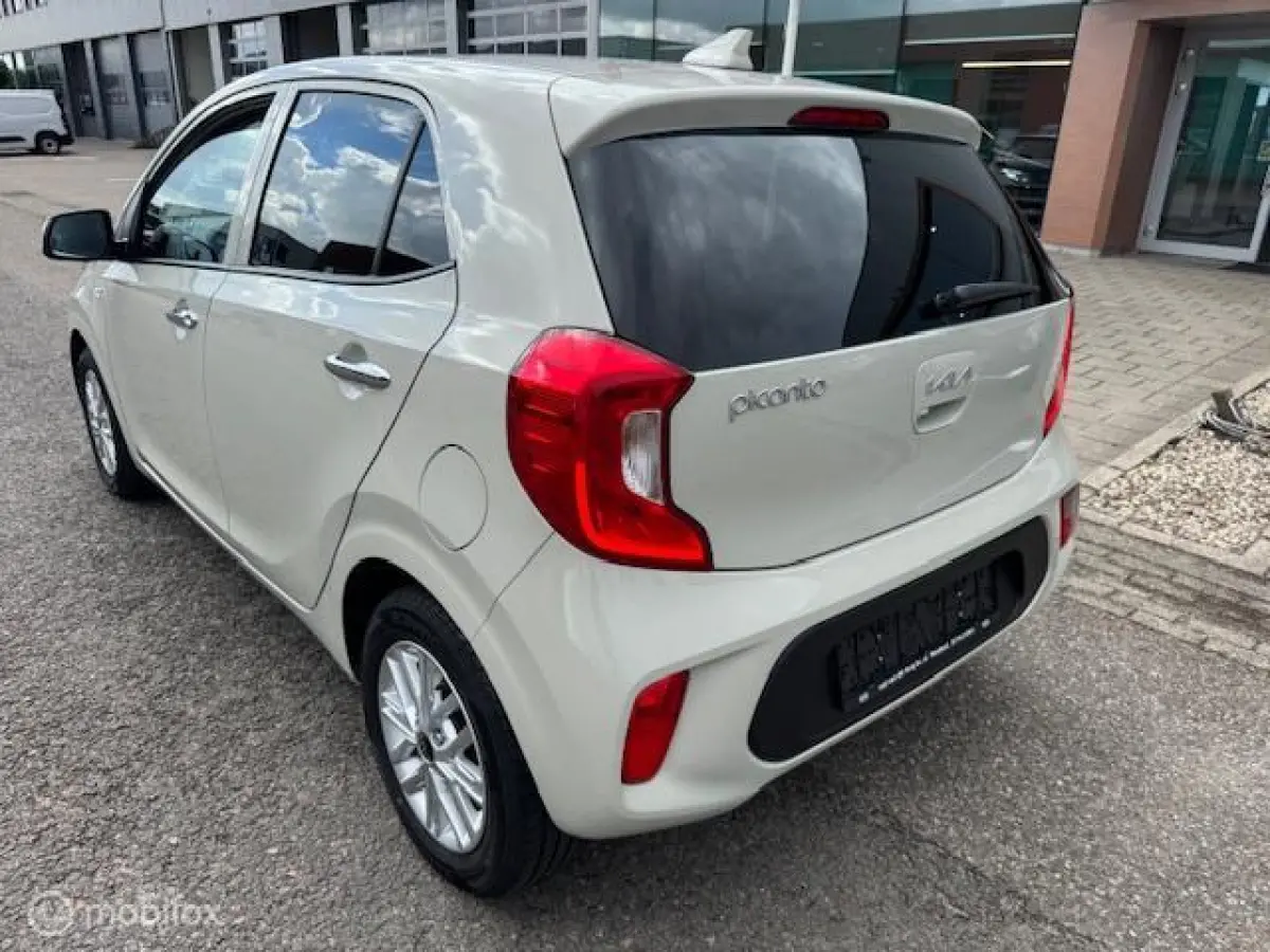 1.0 DPi Dynamic Edition - Stoel & Stuurverwarming, Navigatie via Carplay, Camera achter, Airco, Electr ramen en spiegels, Deurvergr. met afst.diening, Priveglas, Velgen
