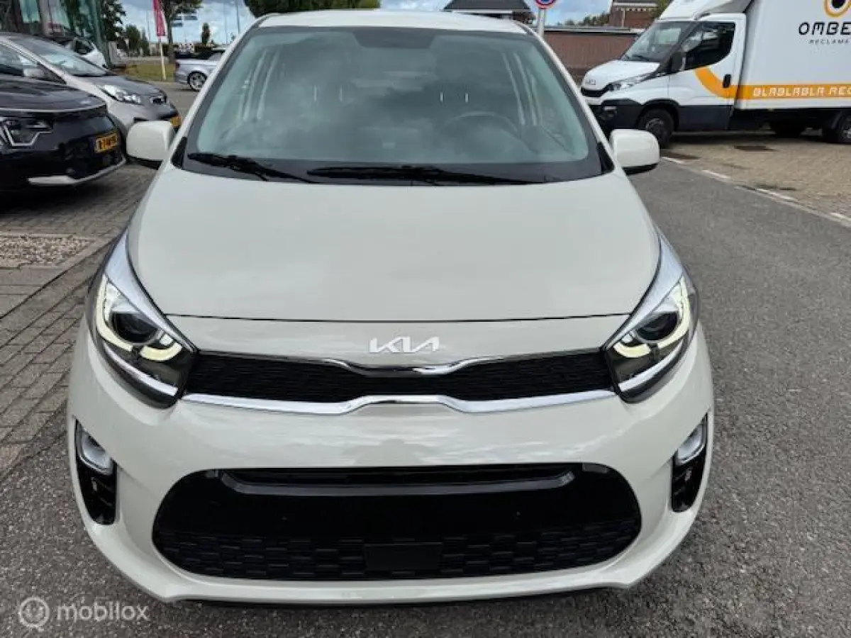 1.0 DPi Dynamic Edition - Stoel & Stuurverwarming, Navigatie via Carplay, Camera achter, Airco, Electr ramen en spiegels, Deurvergr. met afst.diening, Priveglas, Velgen