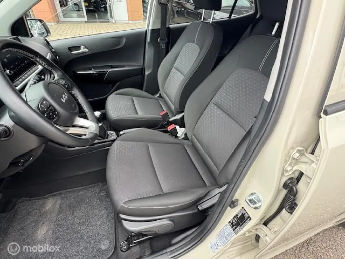 1.0 DPi Dynamic Edition - Stoel & Stuurverwarming, Navigatie via Carplay, Camera achter, Airco, Electr ramen en spiegels, Deurvergr. met afst.diening, Priveglas, Velgen