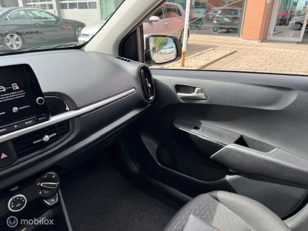 1.0 DPi Dynamic Edition - Stoel & Stuurverwarming, Navigatie via Carplay, Camera achter, Airco, Electr ramen en spiegels, Deurvergr. met afst.diening, Priveglas, Velgen