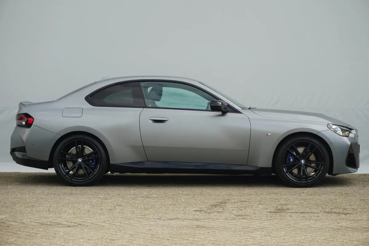 218i Individual Frozen Pure Grey | M Sportpakket | Stuur- en stoelverwarming | Harman Kardon | Innovation Pack | Comfort Pack |