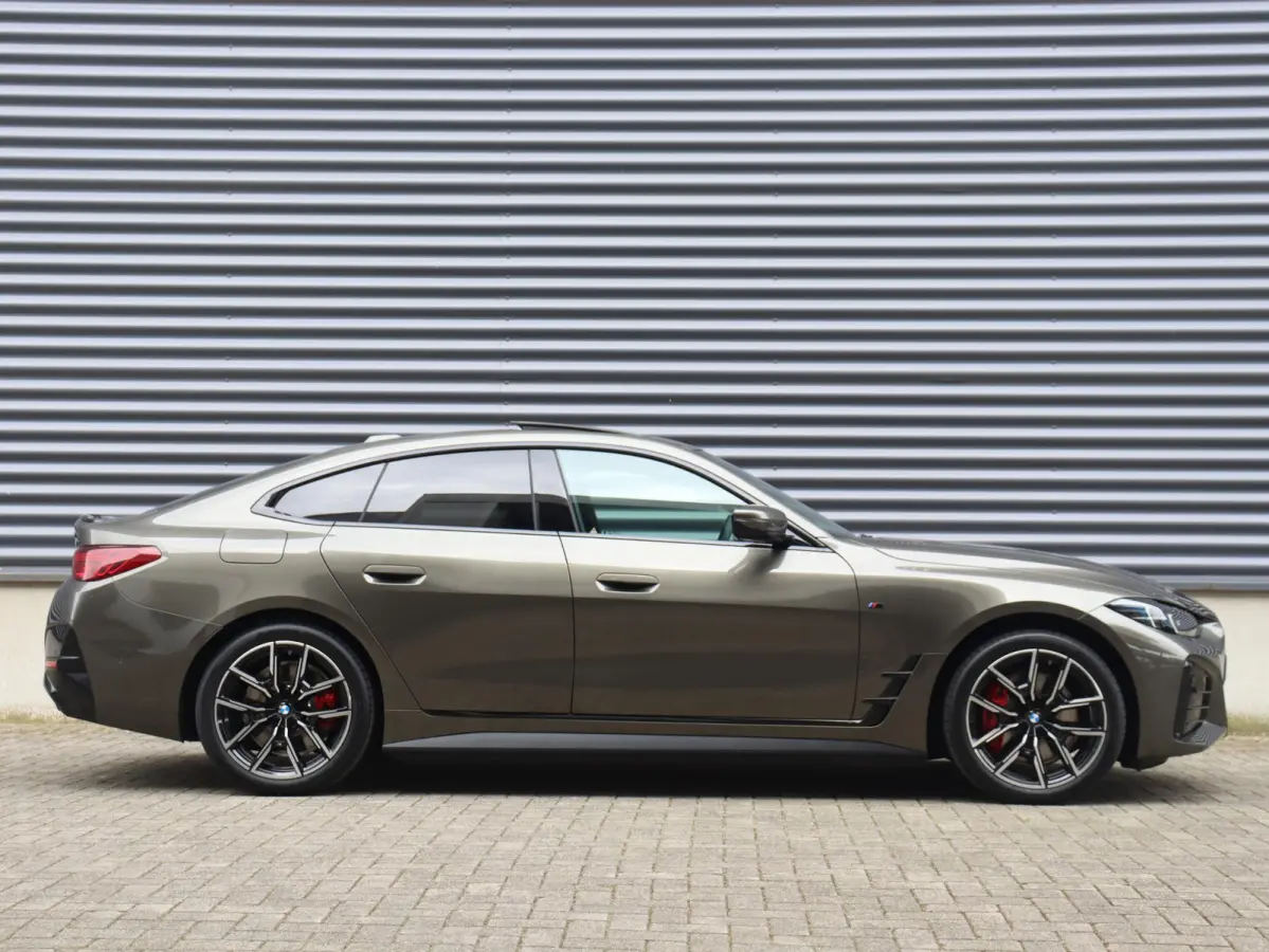 eDrive35 | M Sportpakket Pro | Panodak | Individual Lak | Laserlight | Hi-Fi | Camera | Adaptive Cruise Control | Comfort Access | Stuurwiel Verwarmd | SOH 100% | 19'' LMV