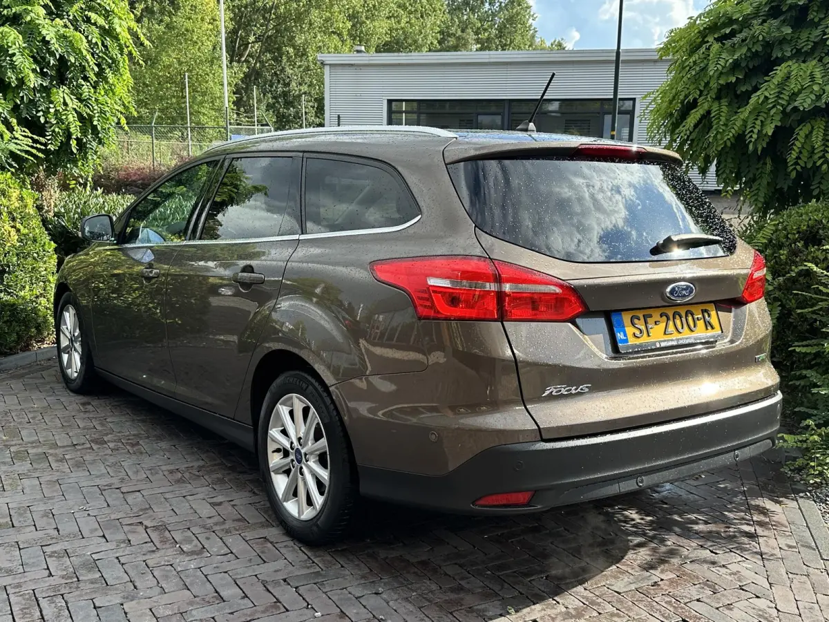 1.0 Titanium Keyless Cruise Control Stoelverw. Navi PDC 16''LM