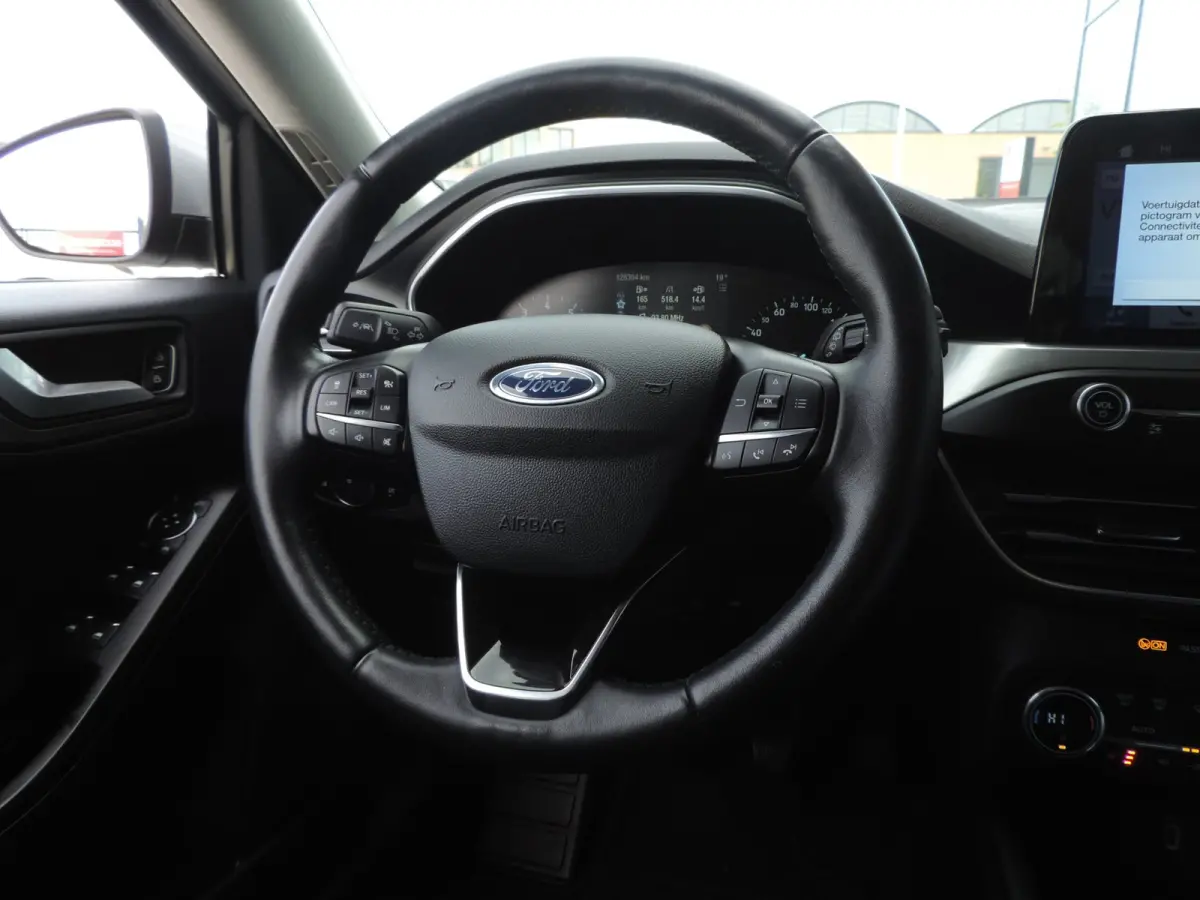 1.0-T 125PK Titanium Business | LED koplamp | Winterpack | Camera | Adapt.cruise | PDC v+a | CarPlay | Priv.glas | ECC