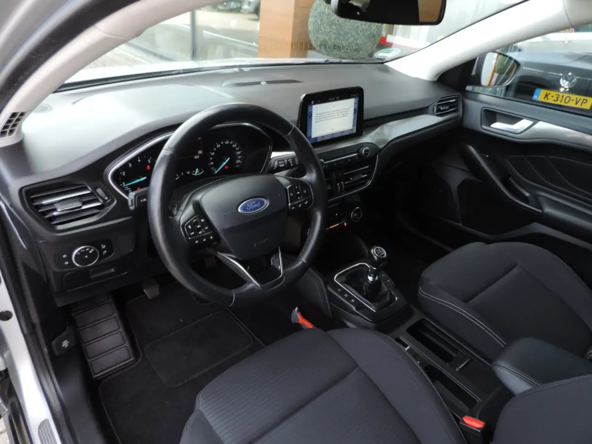1.0-T 125PK Titanium Business | LED koplamp | Winterpack | Camera | Adapt.cruise | PDC v+a | CarPlay | Priv.glas | ECC