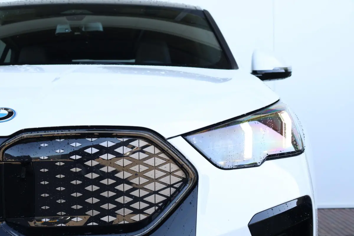 eDrive20 67 kWh M Sport Edition | SoH 100% | M Sportpakket Pro / Panoramadak / Trekhaak / Stuur + Stoelverwarming / Harman-Kardon