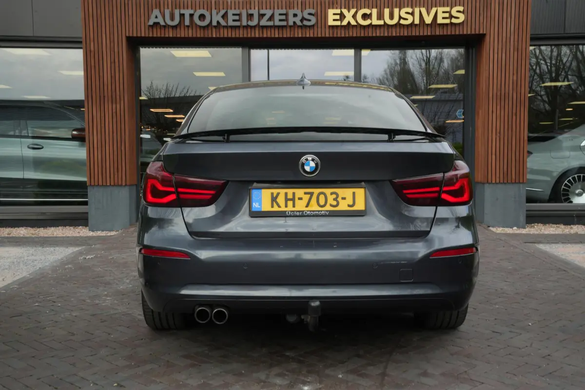 320i Centennial Executive Cruise control Brake assist Hill hold Koplampreiniging