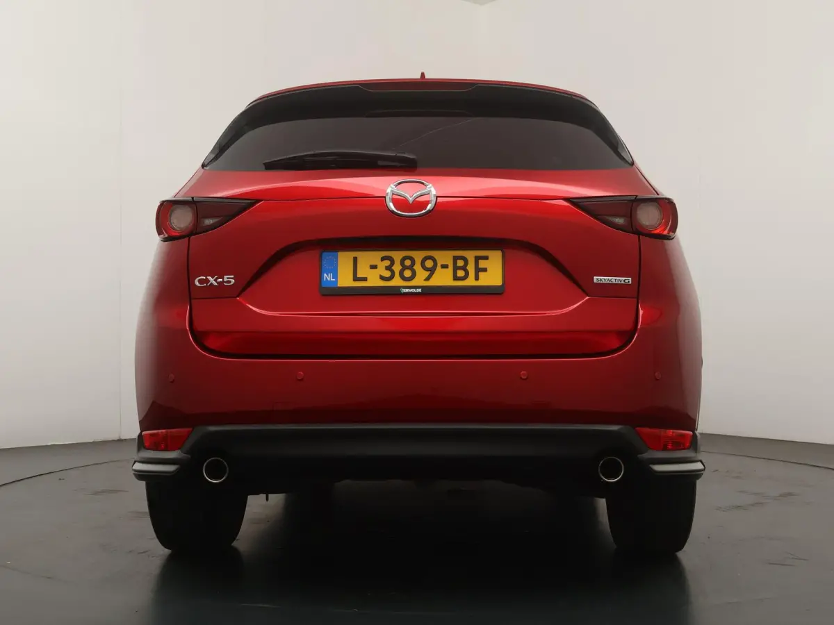 2.0 SkyActiv-G 165 Comfort | Navigatie | 360 Camera | Head-Up | Stoelverw. |