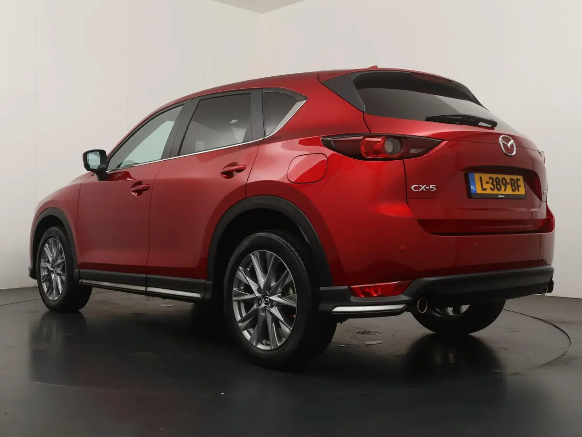 2.0 SkyActiv-G 165 Comfort | Navigatie | 360 Camera | Head-Up | Stoelverw. |