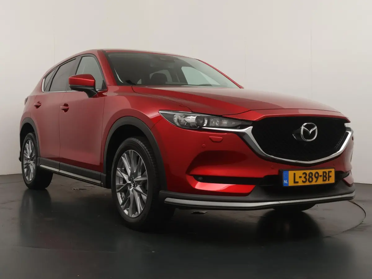 2.0 SkyActiv-G 165 Comfort | Navigatie | 360 Camera | Head-Up | Stoelverw. |