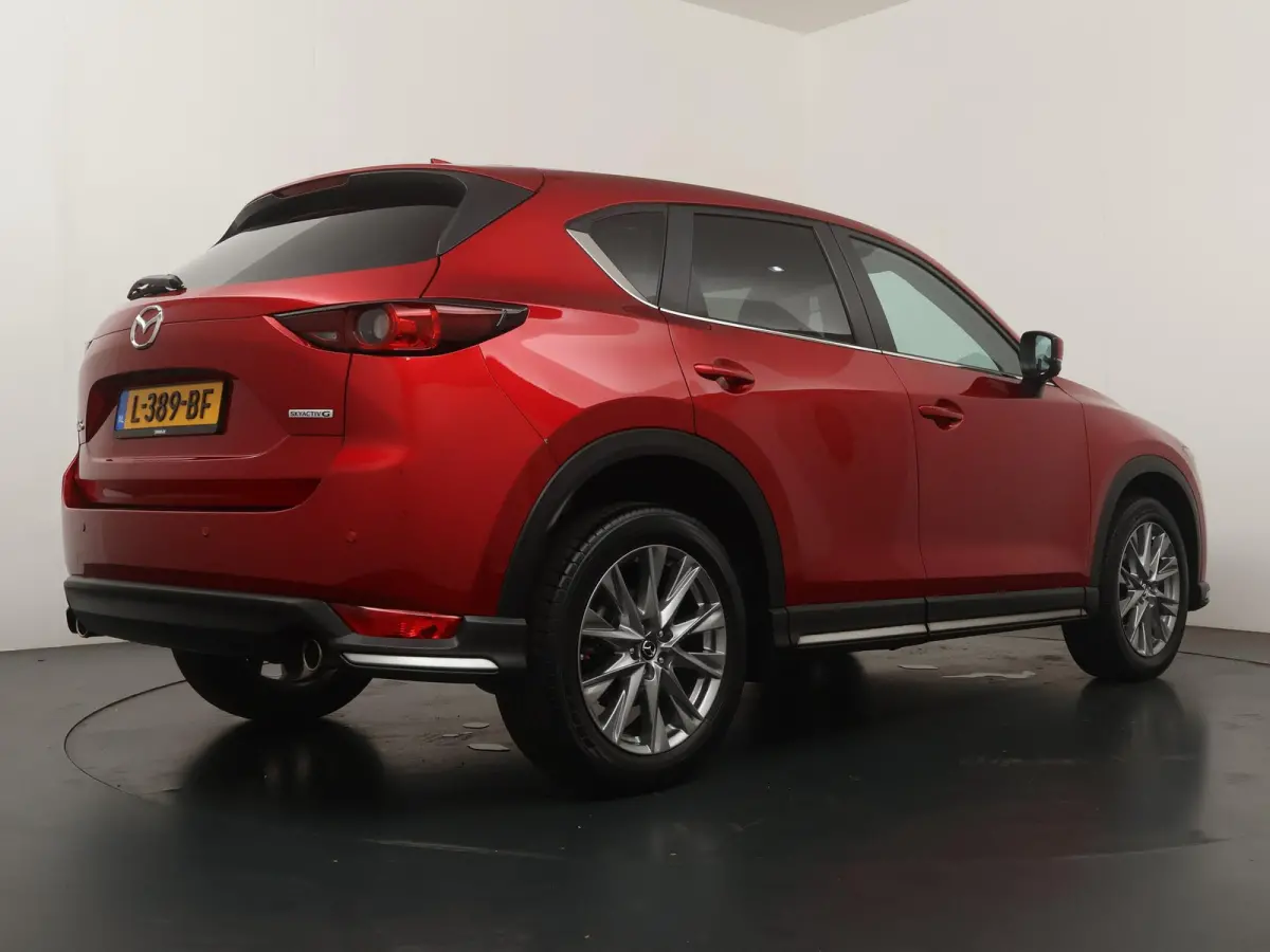 2.0 SkyActiv-G 165 Comfort | Navigatie | 360 Camera | Head-Up | Stoelverw. |