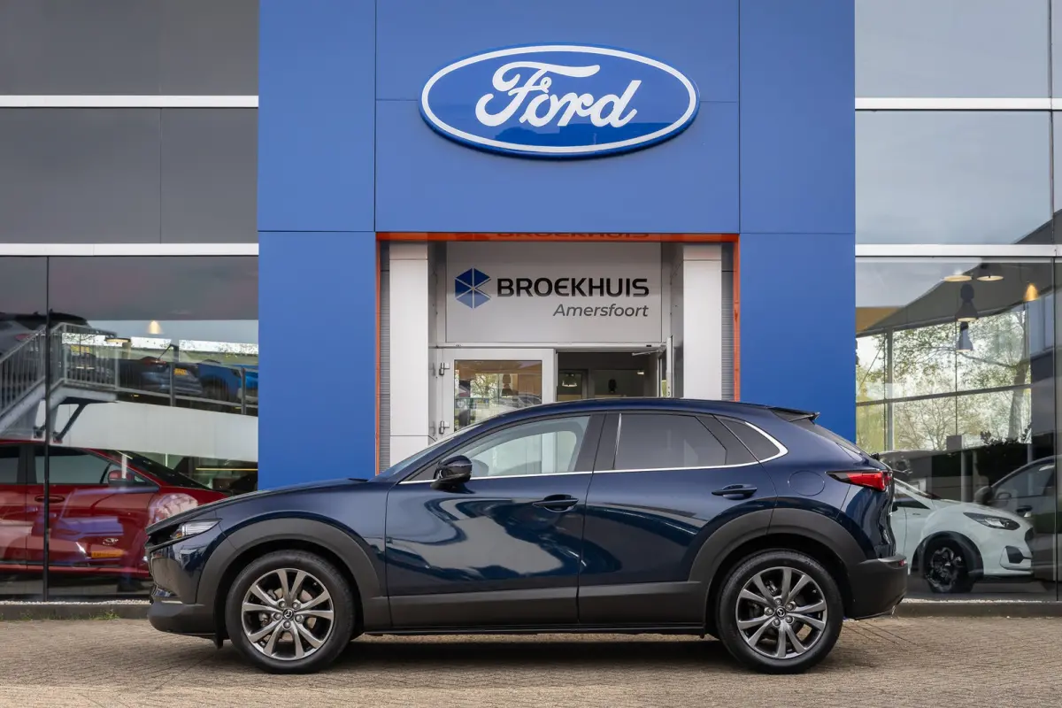 2.0 e-SkyActiv-X M Hybrid Luxury | Head-Up display | BOSE | Camera | Stoel/Stuurverwarming | Leder | Apple Carplay/Android Auto | 18''LM Velgen | Achteruitrijcamera | Apple Carplay/Android A