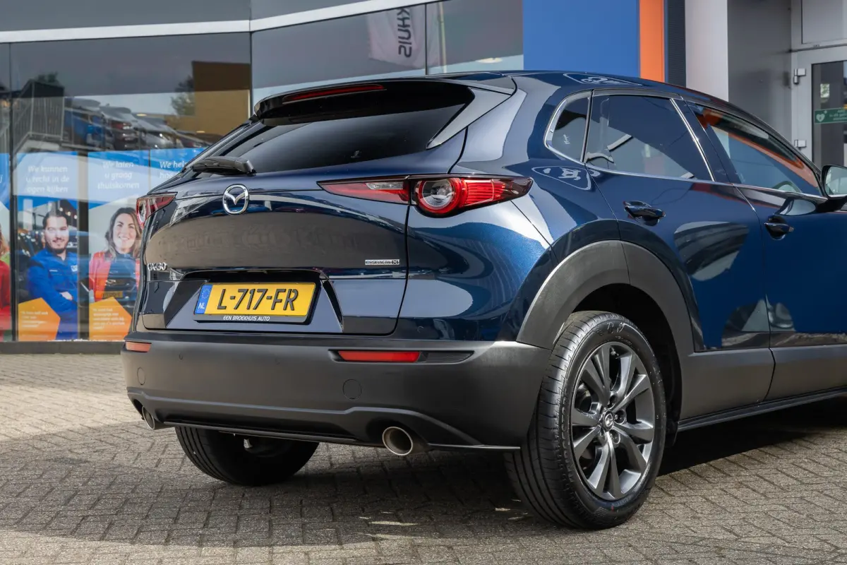 2.0 e-SkyActiv-X M Hybrid Luxury | Head-Up display | BOSE | Camera | Stoel/Stuurverwarming | Leder | Apple Carplay/Android Auto | 18''LM Velgen | Achteruitrijcamera | Apple Carplay/Android A