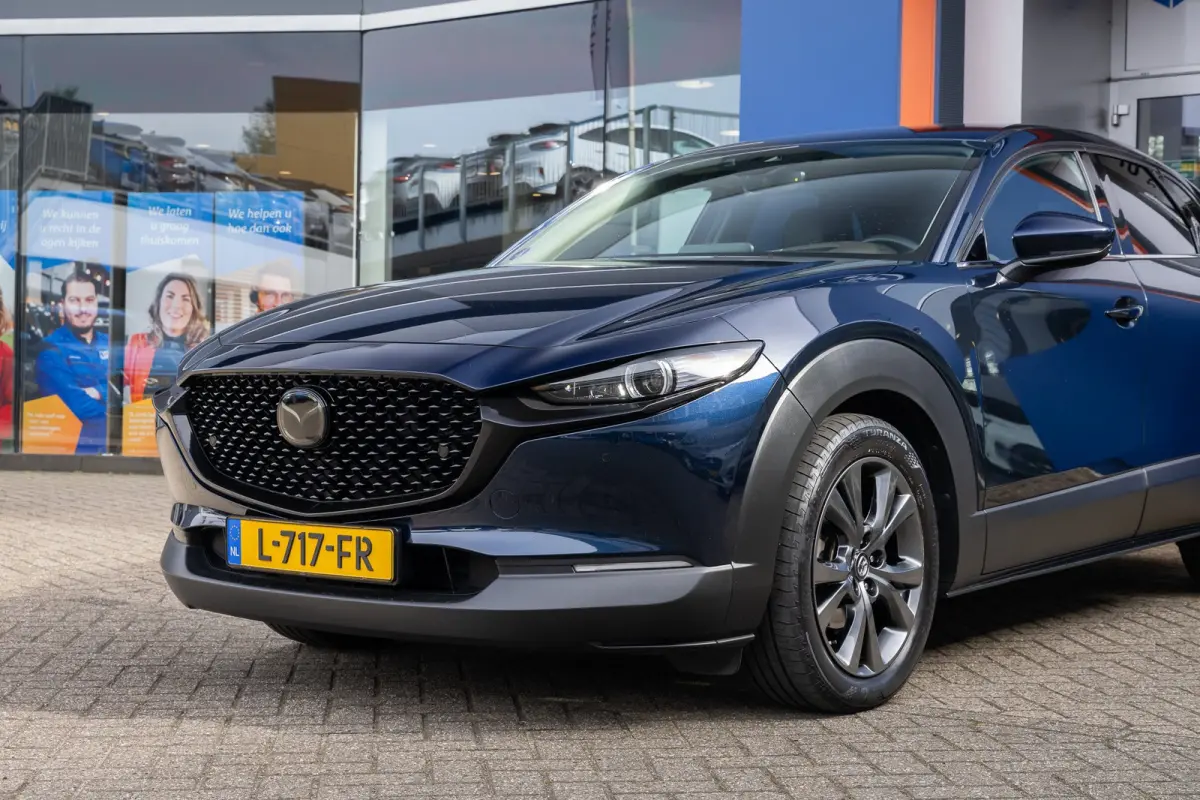 2.0 e-SkyActiv-X M Hybrid Luxury | Head-Up display | BOSE | Camera | Stoel/Stuurverwarming | Leder | Apple Carplay/Android Auto | 18''LM Velgen | Achteruitrijcamera | Apple Carplay/Android A