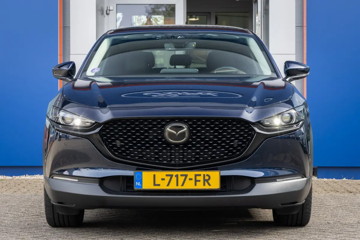 2.0 e-SkyActiv-X M Hybrid Luxury | Head-Up display | BOSE | Camera | Stoel/Stuurverwarming | Leder | Apple Carplay/Android Auto | 18''LM Velgen | Achteruitrijcamera | Apple Carplay/Android A
