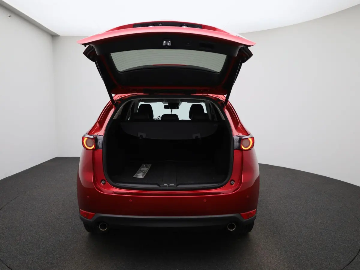 2.0 Skyactiv-G 163 Homura | BOSE AUDIO | HEAD-UP | 360 CAMERA | NAVIGATIE | STOEL-STUURWIELVERWARMING