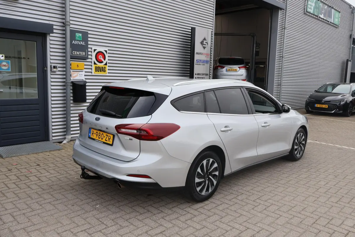 1.0 Hybrid Titanium X 1e Eigenaar | Volledig Onderh | NL-Auto | BTW | Elek Trekhaak | Winterpack | Camera | Navi | Carplay | LED | ACC | Bots | Keyless