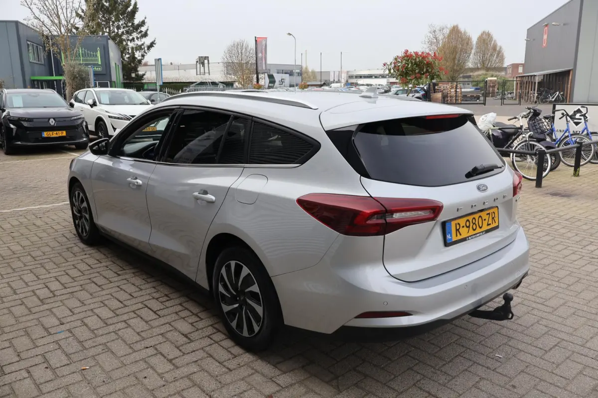 1.0 Hybrid Titanium X 1e Eigenaar | Volledig Onderh | NL-Auto | BTW | Elek Trekhaak | Winterpack | Camera | Navi | Carplay | LED | ACC | Bots | Keyless