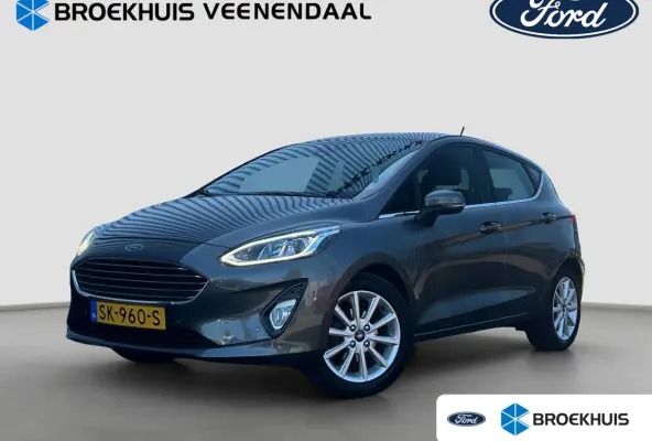 1.0 Titanium | Cruise Control | Trekhaak | Camera | Bluetooth | Navi |