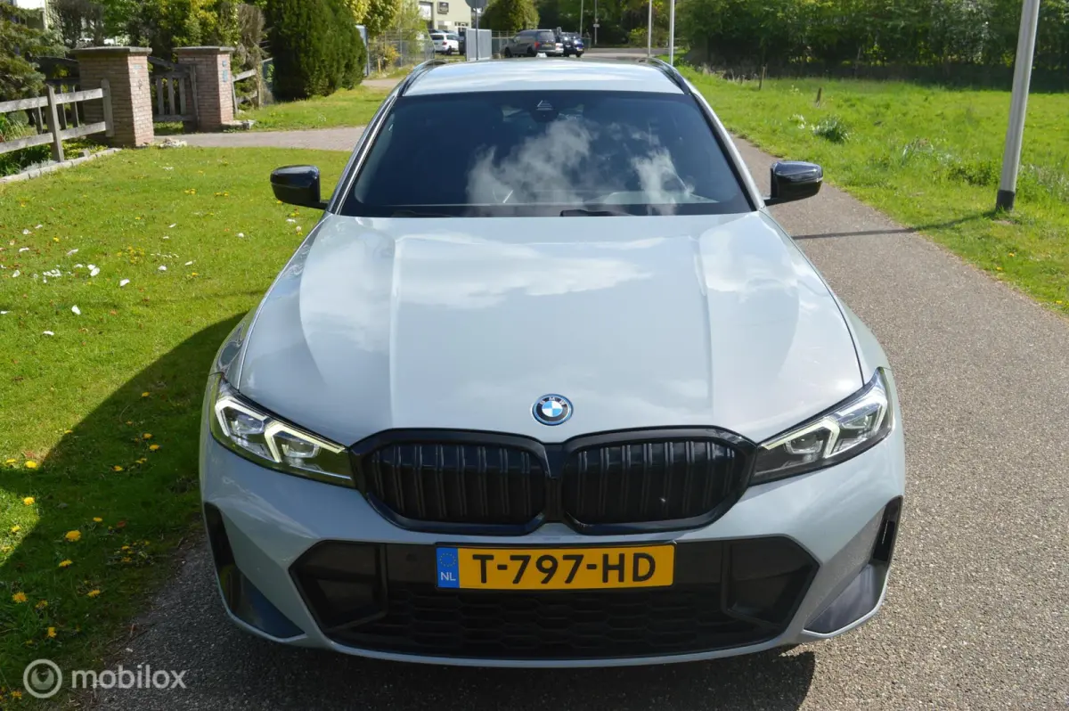 320e