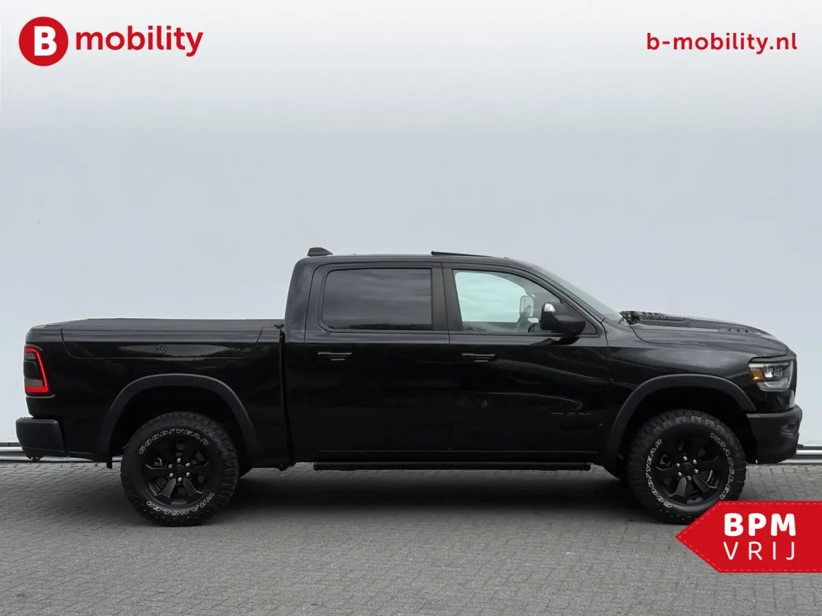 1500 5.7 V8 HEMI 4x4 Crew Cab REBEL Longhorn Panoramadak | Trekhaak | RAM BOX | Leer | Apple CarPlay | Camera