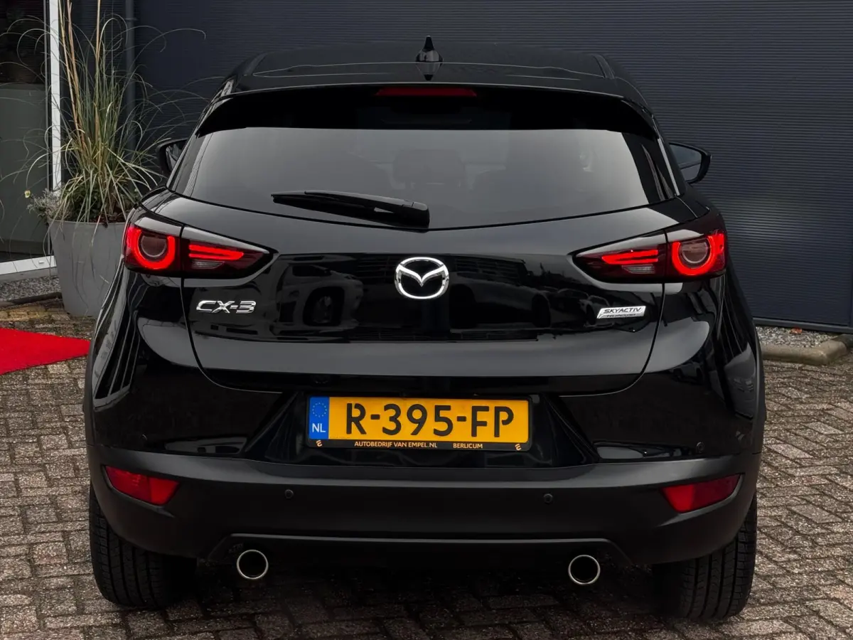 2.0 SkyActiv-G 120 GT-M | Camera | Adaptive Cruise | BOSE | Stoelverwarming | Automaat | Head-up Display