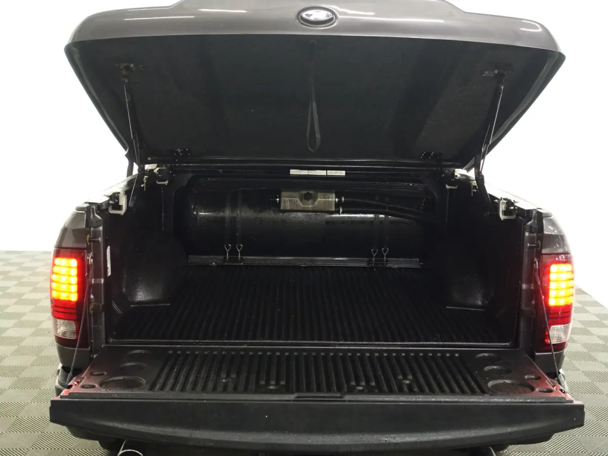 1500 5.7 V8 4x4 Quad Cab 6'4 Laramie Aut- LPG G3, Schuifdak, Elek Verwarmd/Geventileerd Interieur, Alpine Audio, Camera