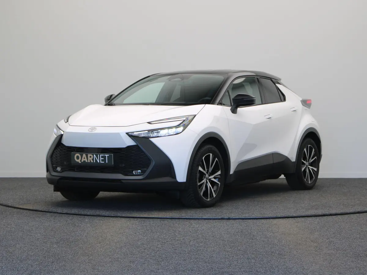 2.0 Plug-in Hybrid 220 First Edition | Stoel- en stuurwielverwarming | Voorruitverwarming | Keyless Entry | All Season Banden |