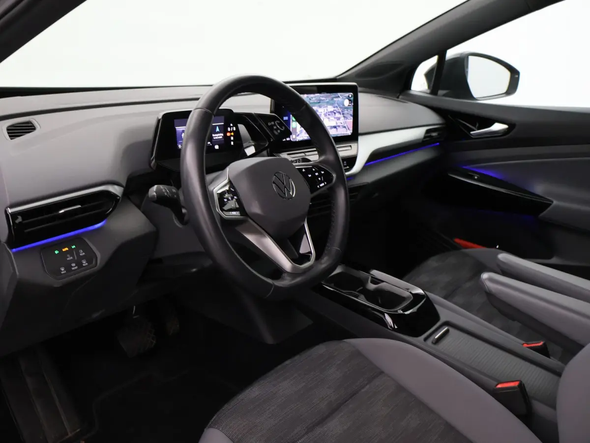 PRO 77 kWh + ADAPTIVE CRUISE | STUURVERW. 91% SOH | STOELVERW. | SFEERVERLICHTING | DRAADLOZE CARPLAY