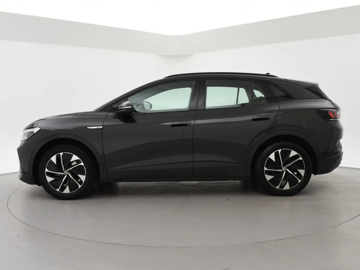 PRO 77 kWh + ADAPTIVE CRUISE | STUURVERW. 91% SOH | STOELVERW. | SFEERVERLICHTING | DRAADLOZE CARPLAY